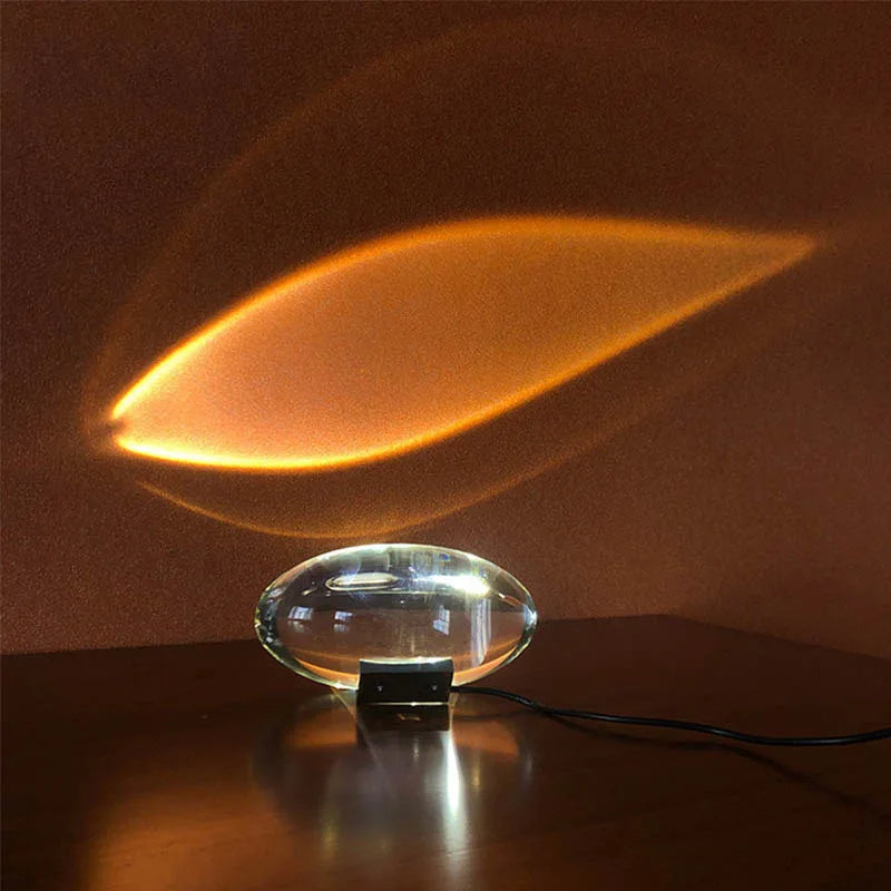 Crystal eye night lamp projecting a warm oval light pattern on a textured wall