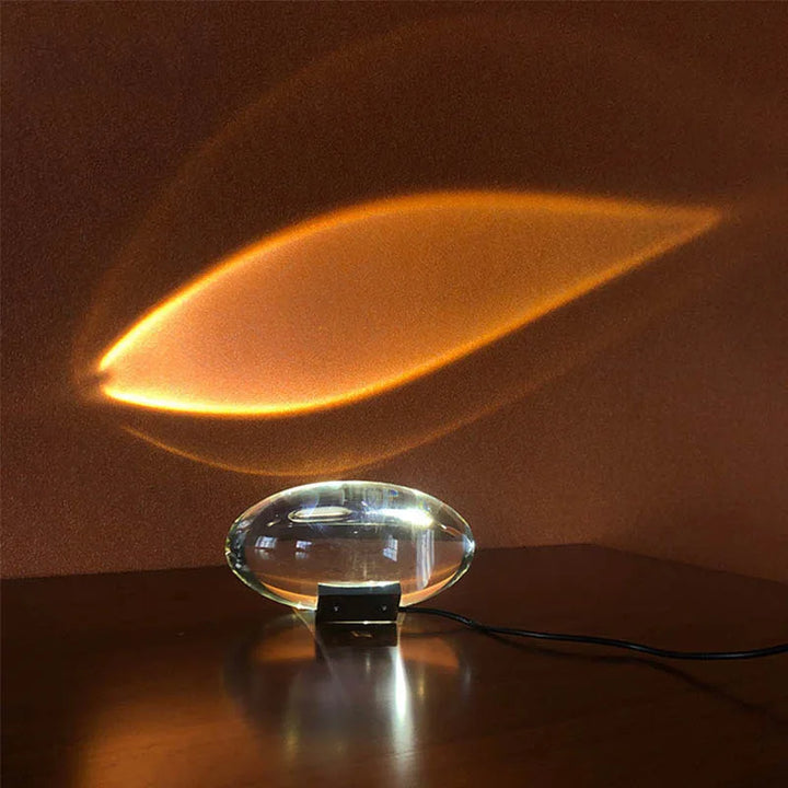 Crystal eye night lamp projecting a warm oval light pattern on a textured wall