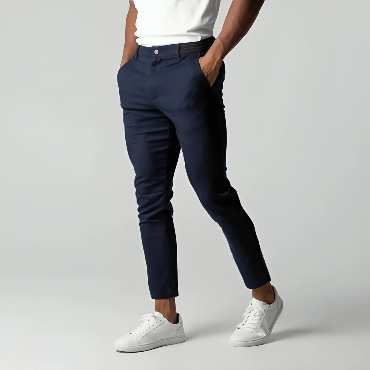 Close-up of fabric texture and button closure detail on men's stretch casual trousers
