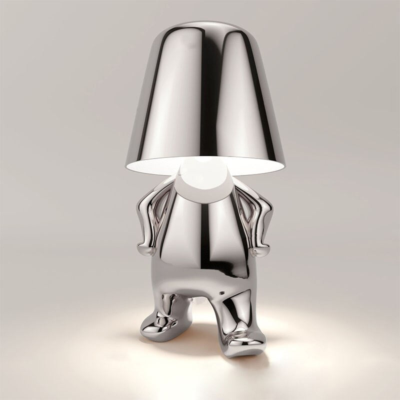 Close-up of the touch control sensor on a modern wireless table lamp