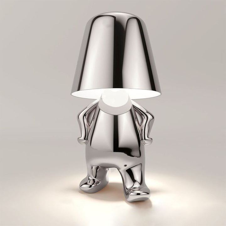 Close-up of the touch control sensor on a modern wireless table lamp