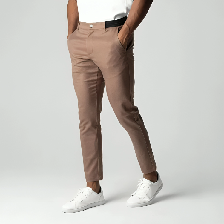 Flat lay of men's modern fit chinos folded neatly, showcasing versatile menswear style