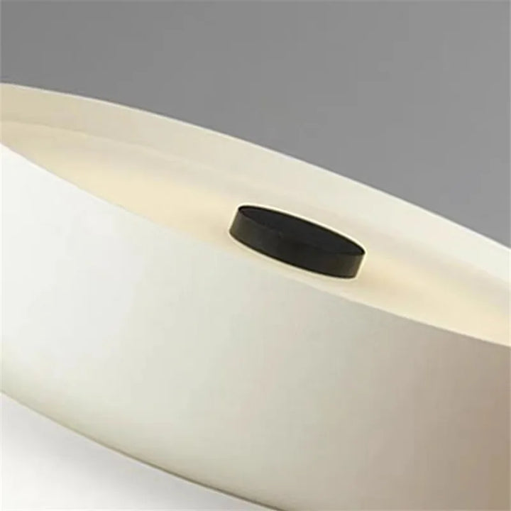 Close-up view of the slim profile and sleek metal finish of the modern LED lamp.