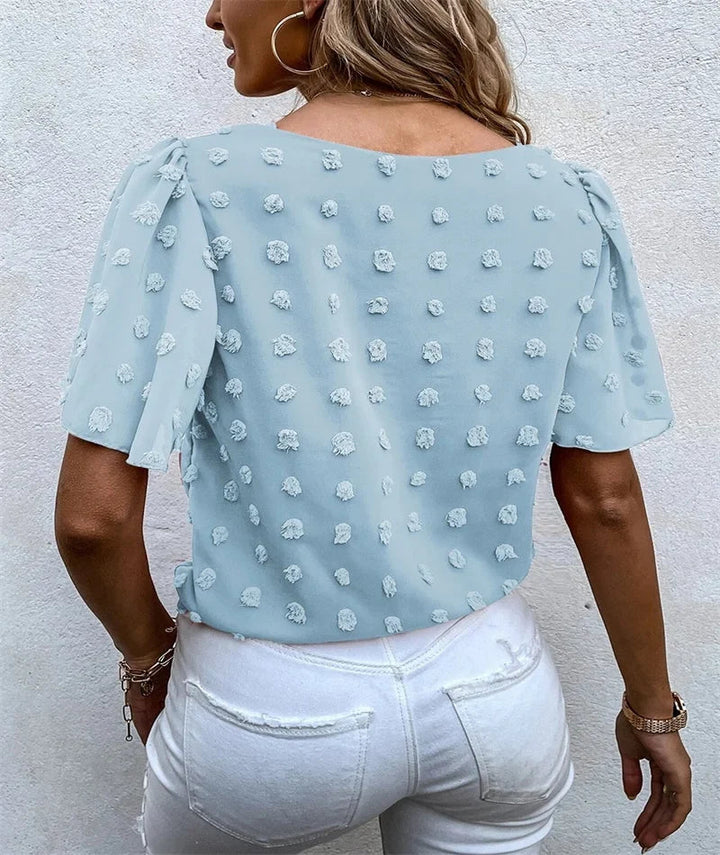 Back view of the casual chic short sleeve floral party wear shirt