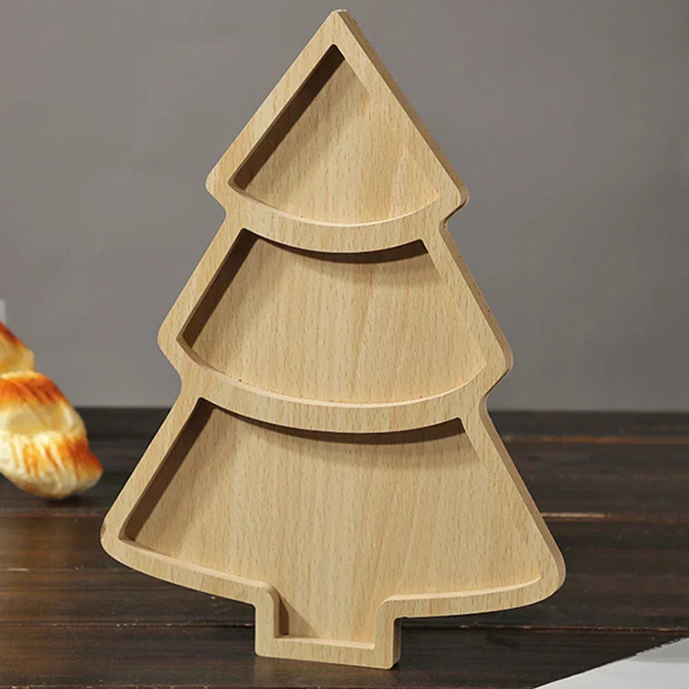 Single segmented wooden Christmas tree serving board standing upright on a table