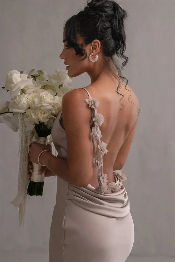 Side view of women floral patchwork maxi dress showing sleeveless elegant design