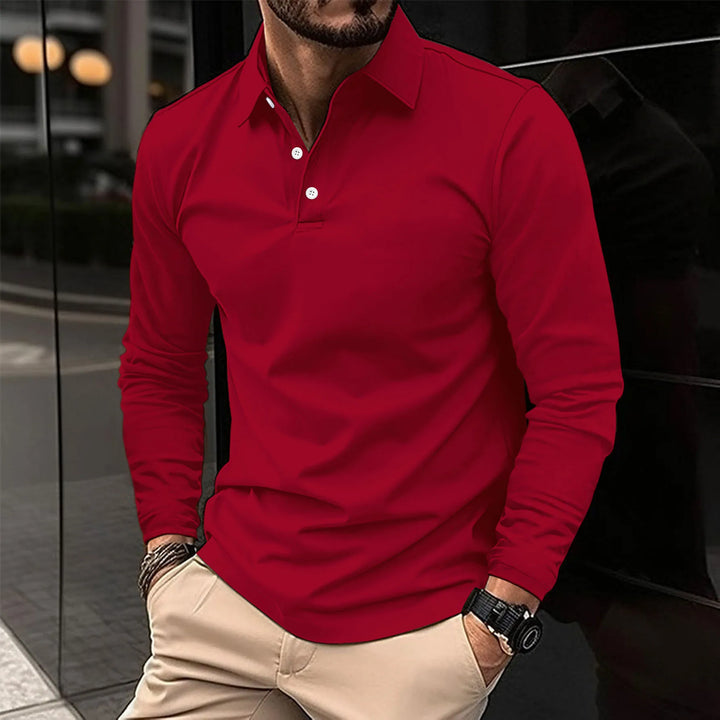Side profile of a man wearing a stylish long-sleeved polo shirt