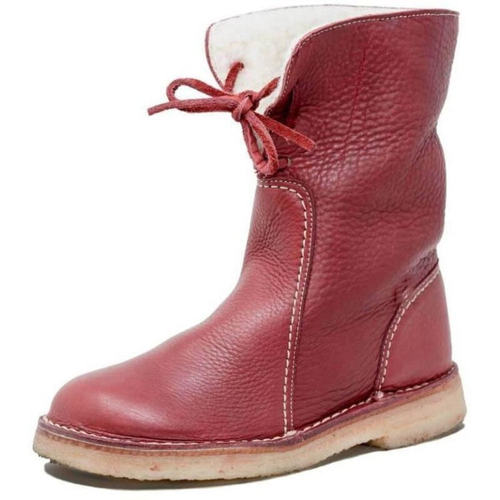 Women's cozy winter ankle boots in soft suede with warm faux fur lining