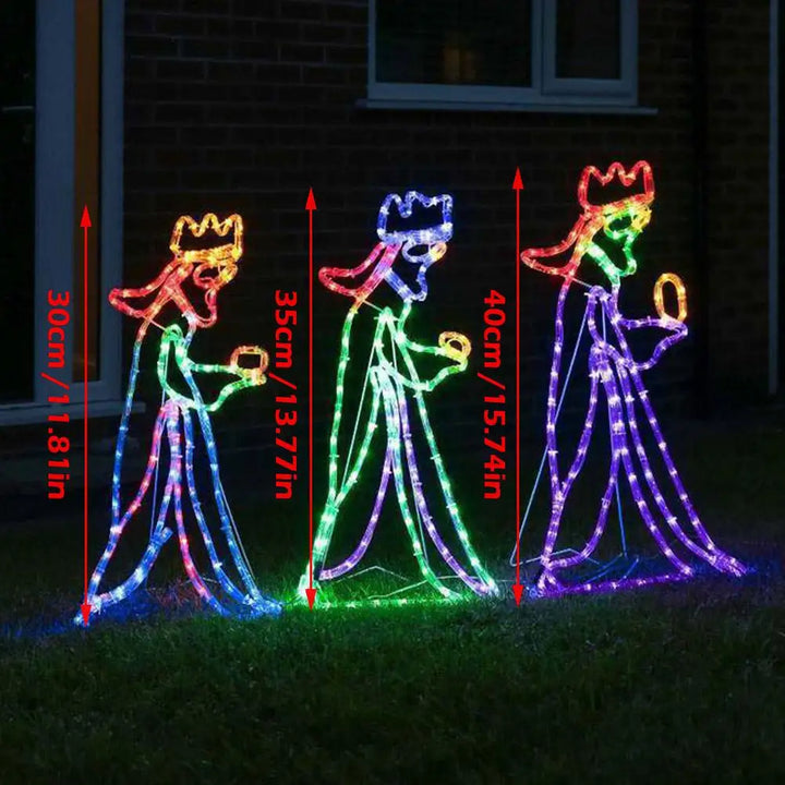 Outdoor winter lighting featuring a bright Three Wise Men silhouette display