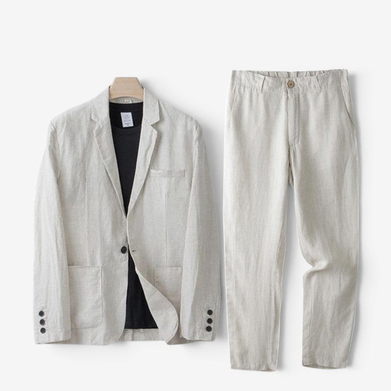 Men's beige two-piece blazer and trousers set laid flat