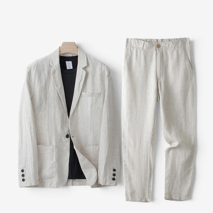 Men's beige two-piece blazer and trousers set laid flat