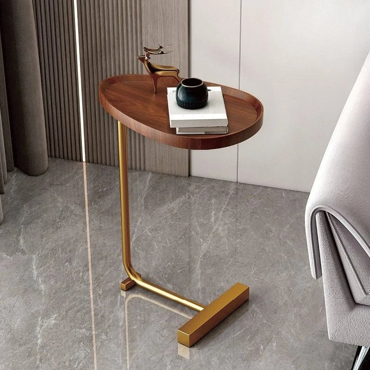 Minimalist small space furniture piece serving as a convenient couch side table
