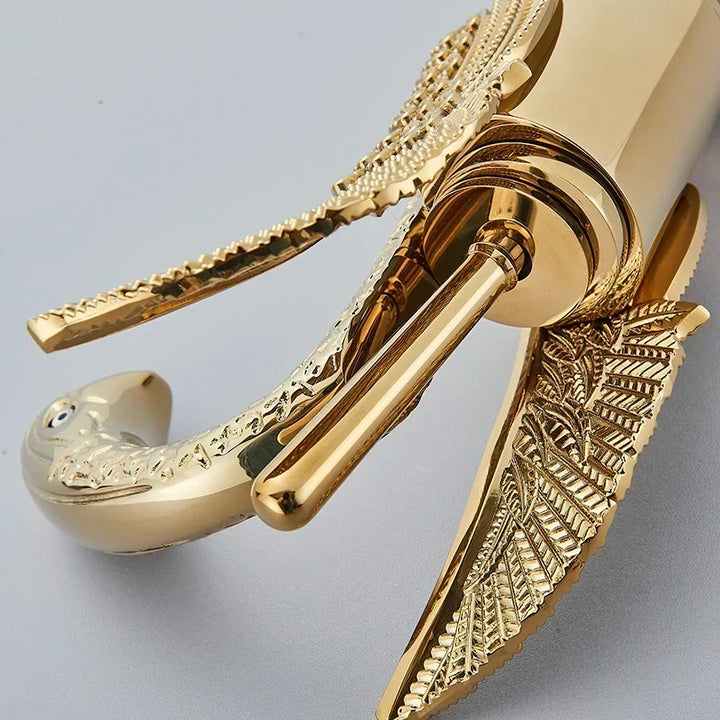 Top-down view of the golden basin tap demonstrating spout reach and water flow area