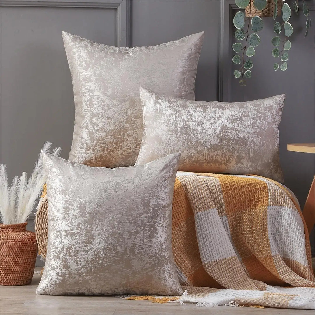 Light gray Nordic minimalist cushion covers displayed in various sizes on a sofa