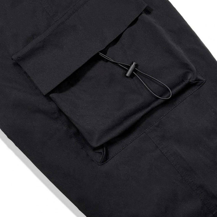 Streetwear pants detailed shot of secure cargo pocket snap button closure
