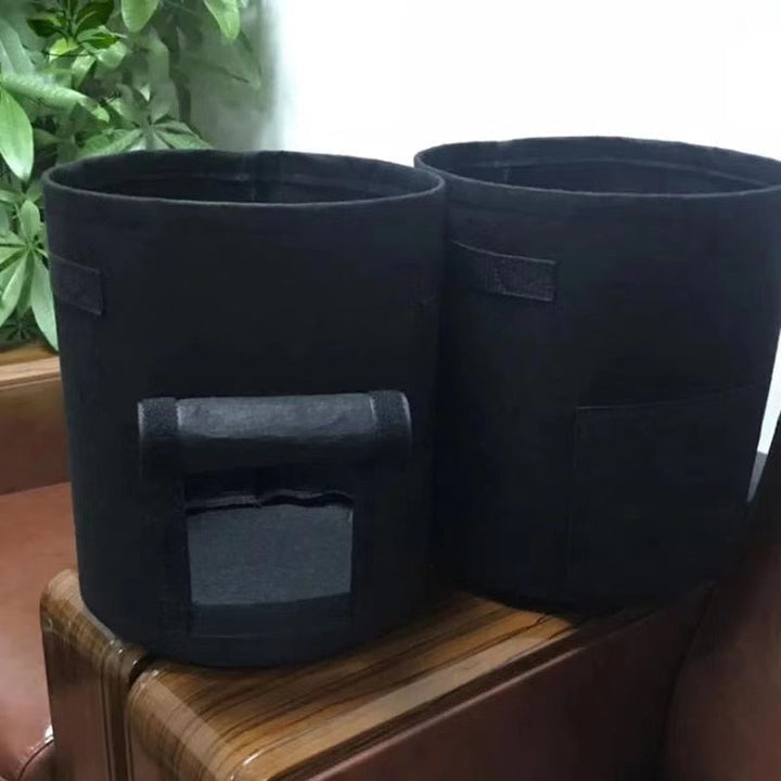 Black GrowMaster fabric vegetable pots displayed together