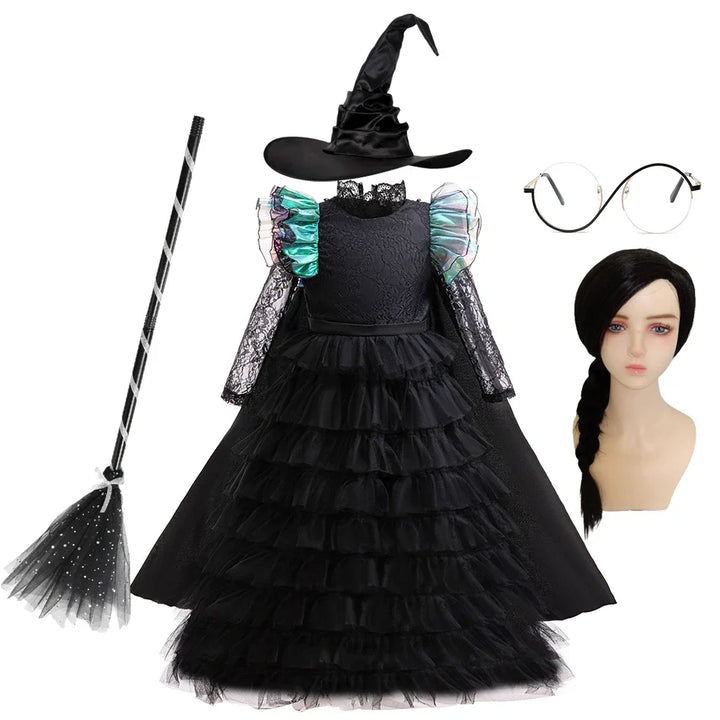 Back view of the emerald green girls witch costume showing the elegant ball gown skirt and bodice