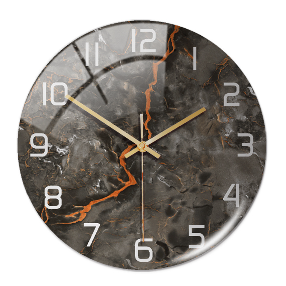 Minimalist round marble wall clock mounted on a neutral wall, blending seamlessly into contemporary interior spaces.