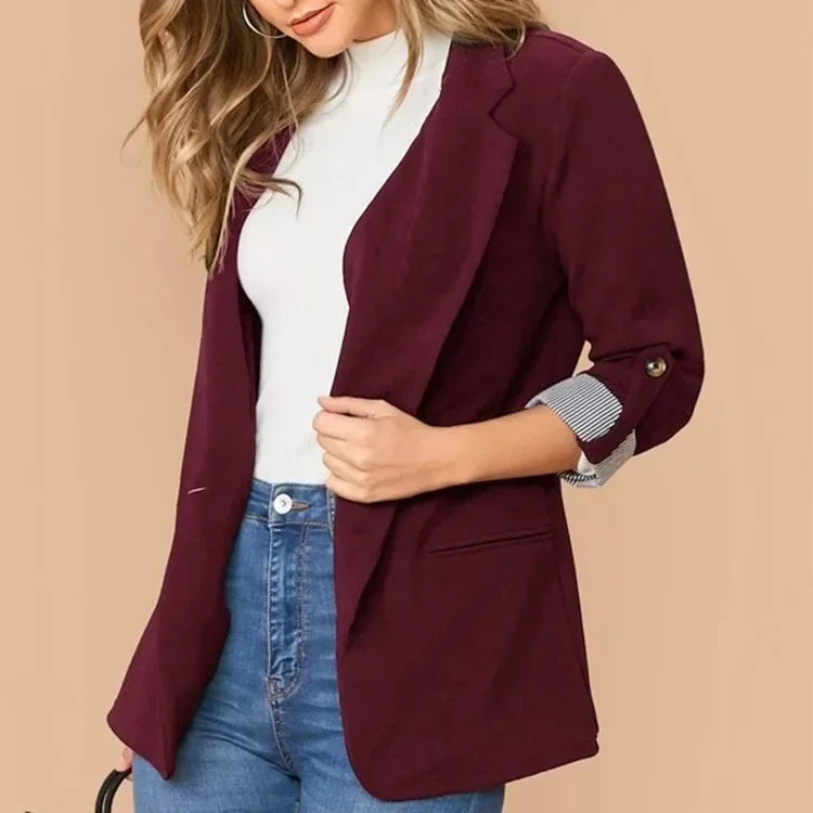 Elegant womens blazer styled with casual trousers