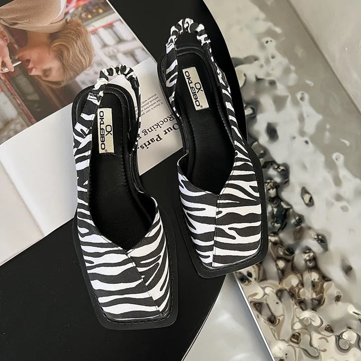 Bottom sole view of fashionable womens fashion footwear showing traction