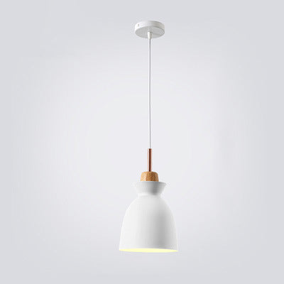 White bell shaped Nordic metal pendant lamp hanging against a neutral background