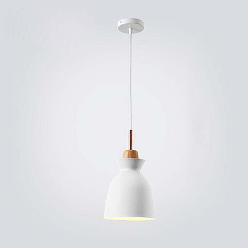 Detailed view of the metal pendant light cord and ceiling canopy