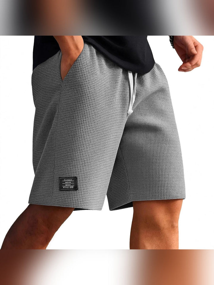 Interior label and breathable mesh lining of men's summer shorts