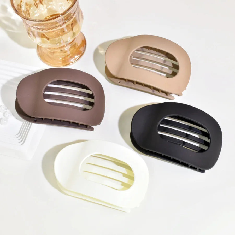 Side profile of a trendy flat hair clip showing durable interlocking teeth