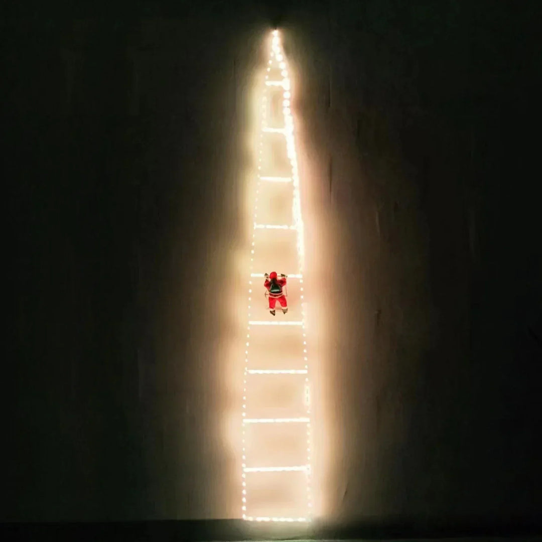 Single vertical string light decoration with Santa Claus figure