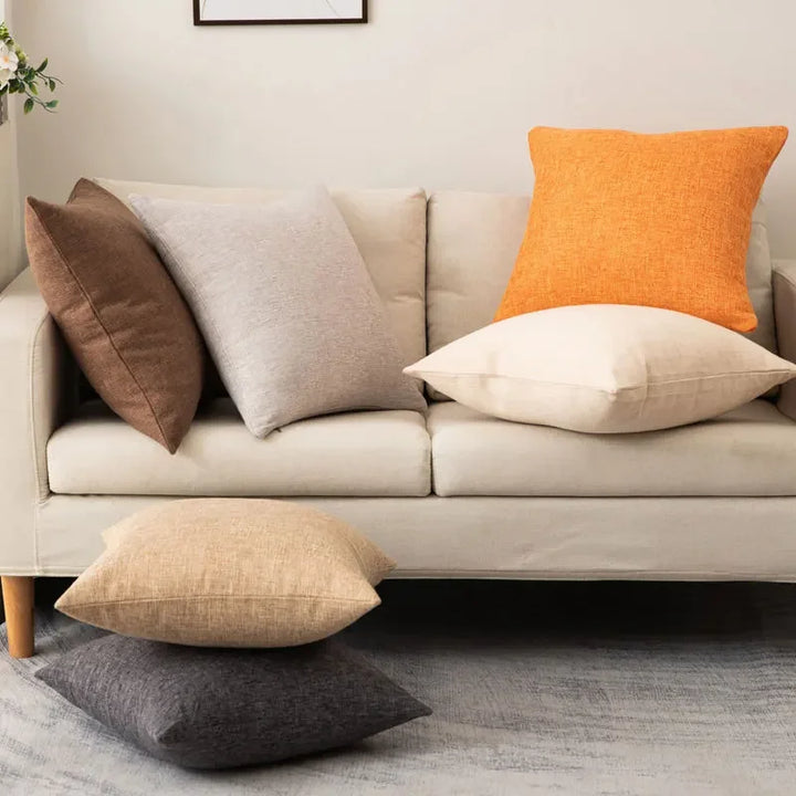 Comfortable cushion with insert styled neatly on a living room couch