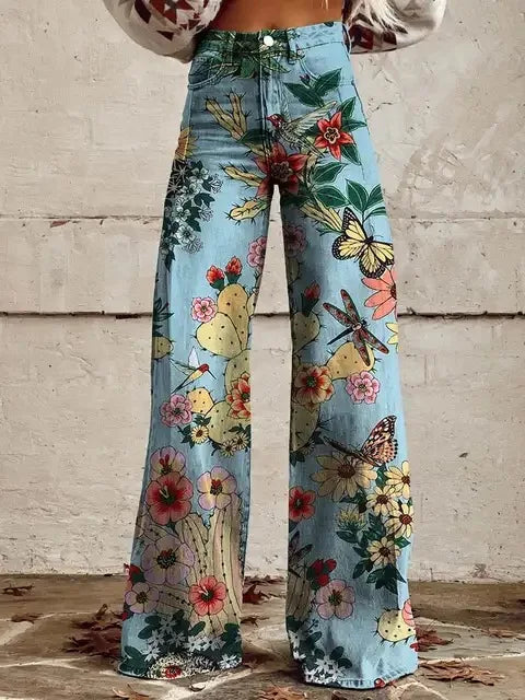 Light blue women's floral and butterfly print trousers in style 2