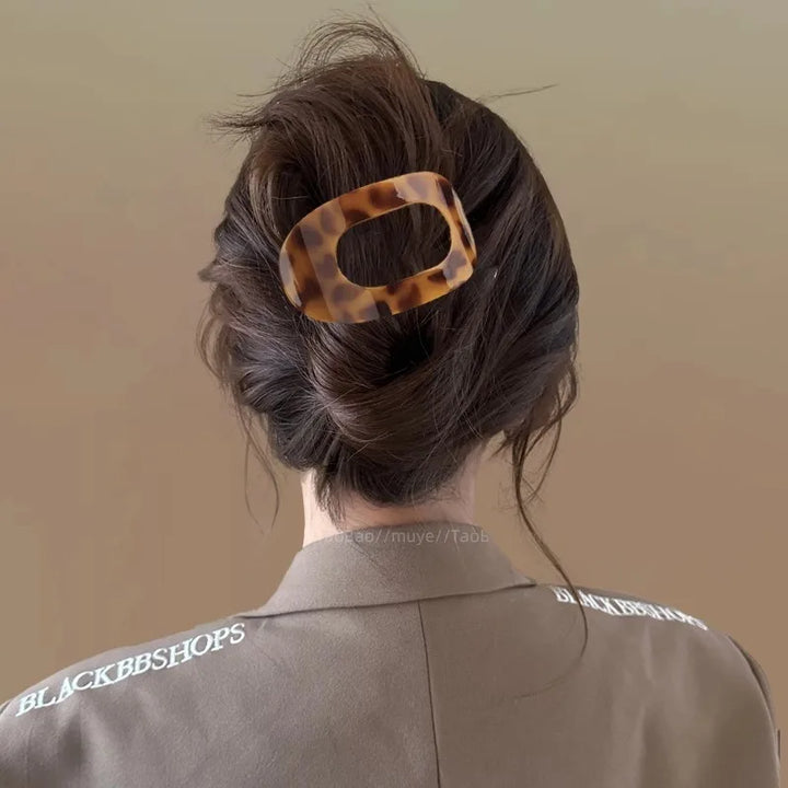 Matte finish large flat oval hair claw clip for secure hairstyling