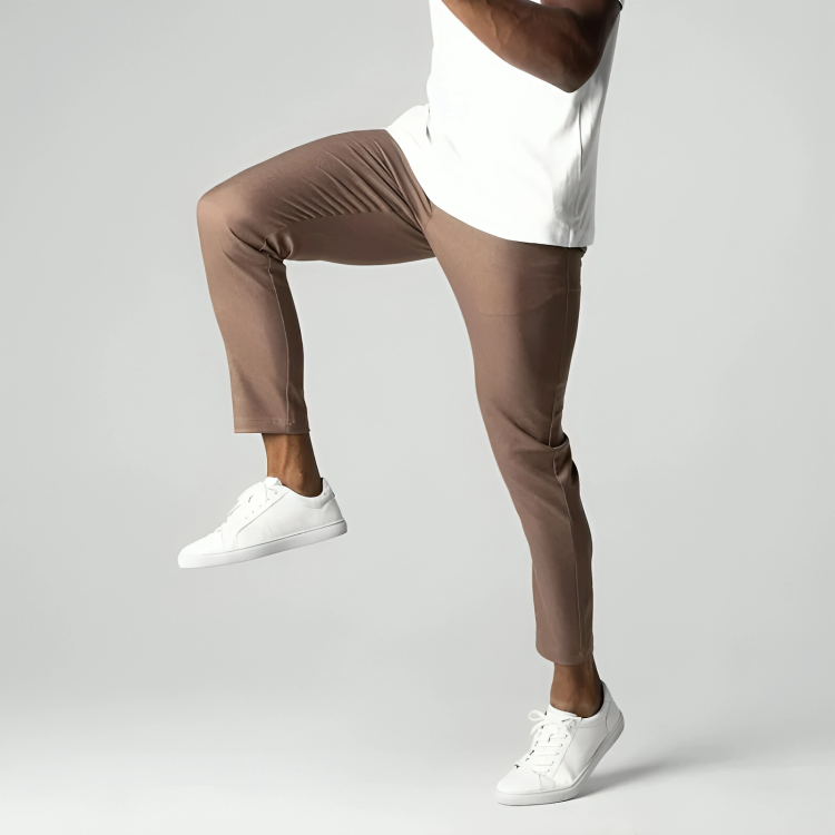 Men's khaki stretch pants paired with a casual shirt for a smart-casual outfit look