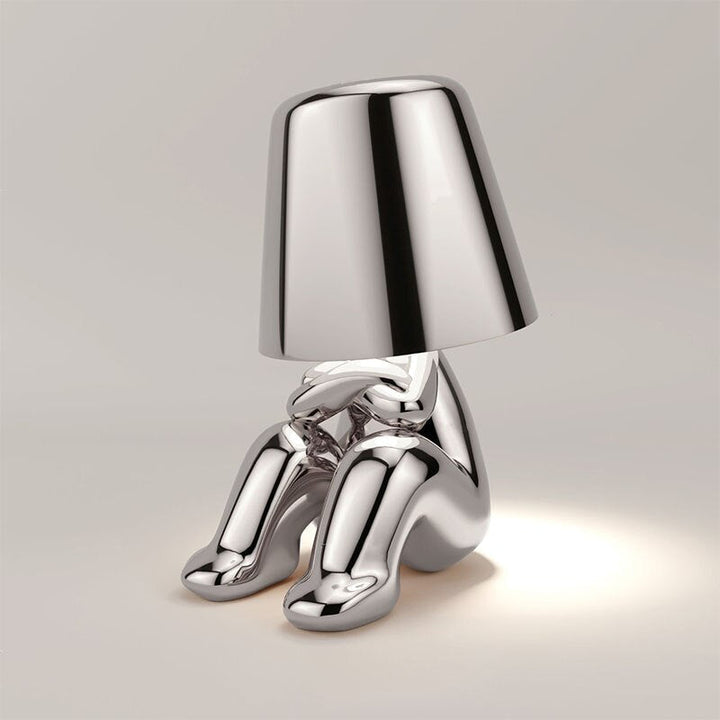 Silver touch control lamp placed elegantly on a dining room sideboard for ambient lighting