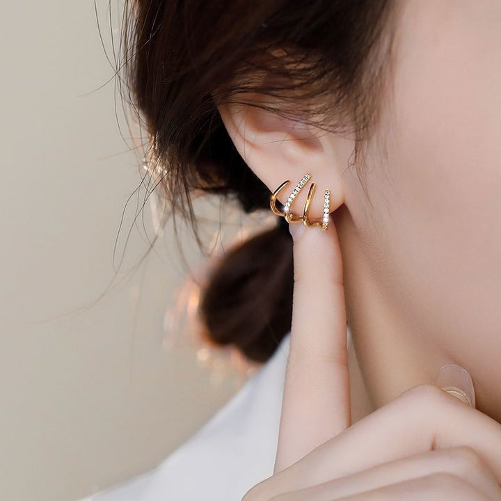 Gold claw hoop ear climber set for women showcasing unique angles