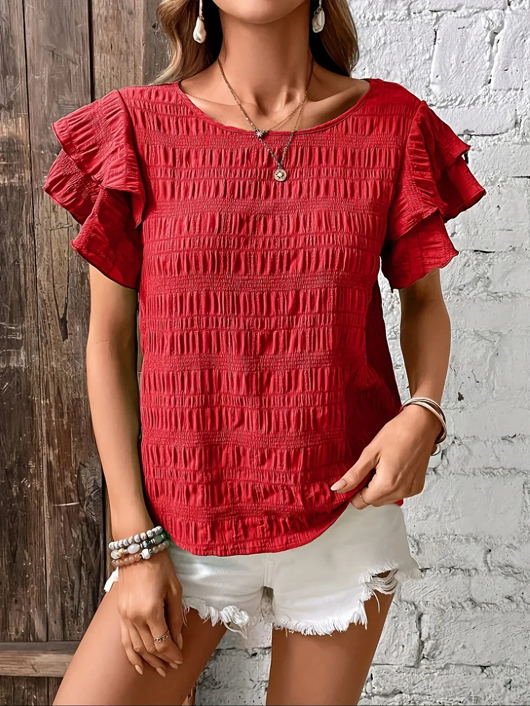 Trendy casual shirt showcasing the stylish shoulder ruffle details