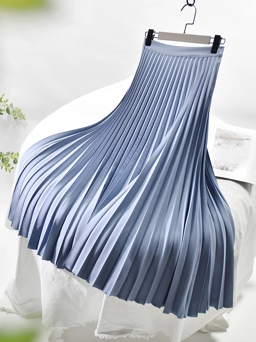 Detailed shot of the elastic waistband on a women's midi skirt
