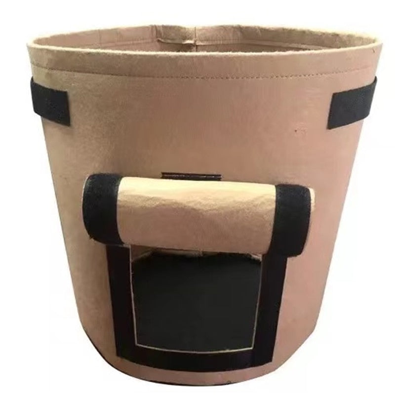 Sturdy reinforced handles on black fabric garden pot for easy moving