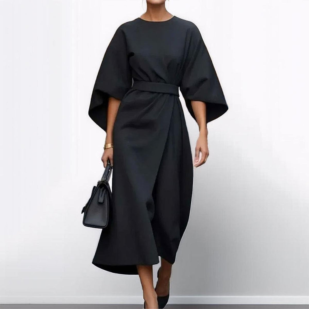 Full length view of elegant kimono sleeve maxi dress styled for parties