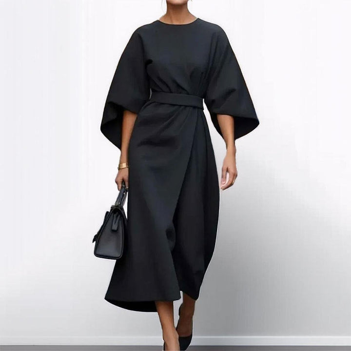 Full length view of elegant kimono sleeve maxi dress styled for parties