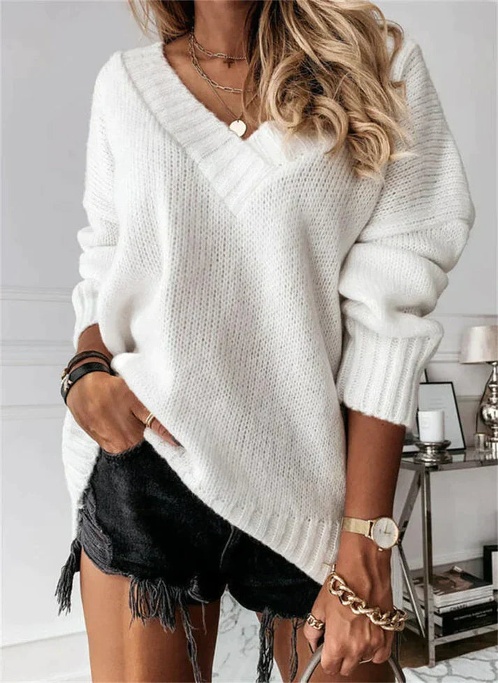 Flat lay of casual womens cozy winter knitwear sweater
