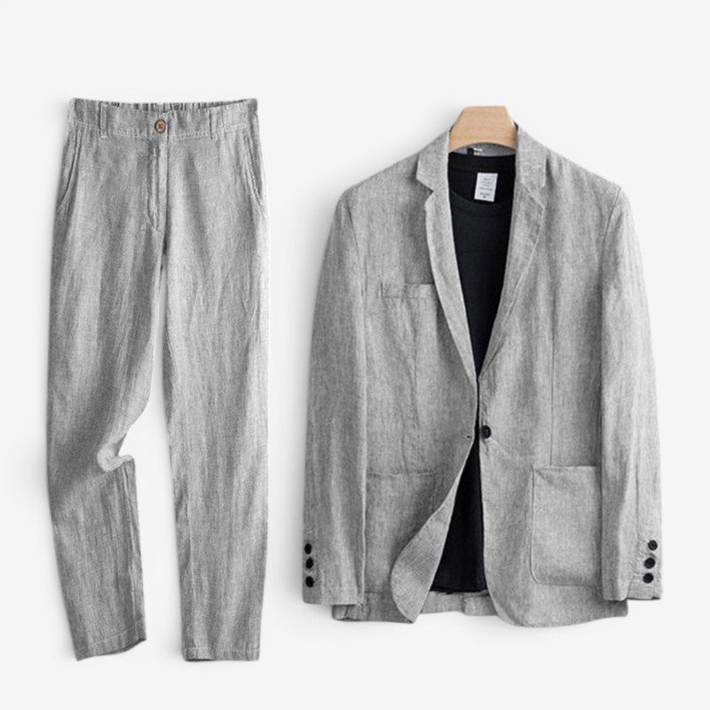 Men's grey two-piece blazer and trousers set shown together