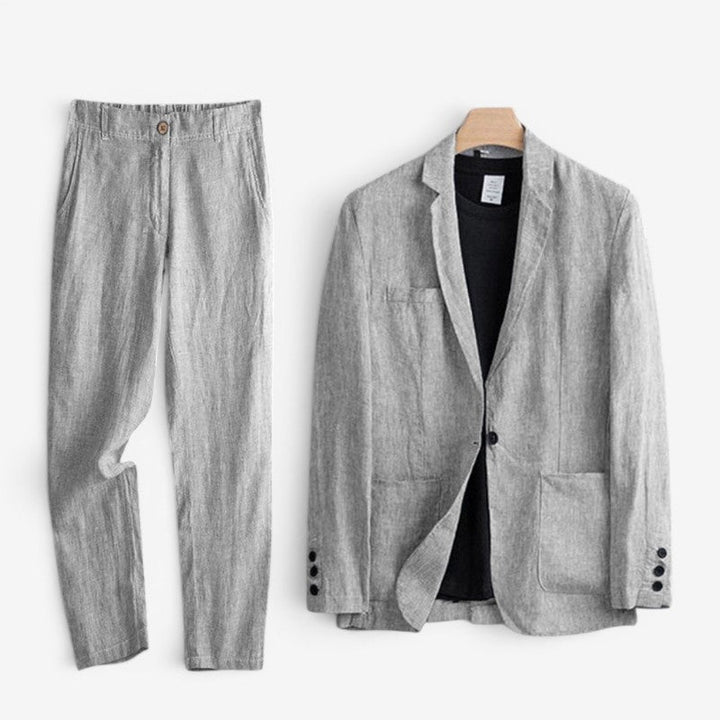 Men's grey two-piece blazer and trousers set shown together