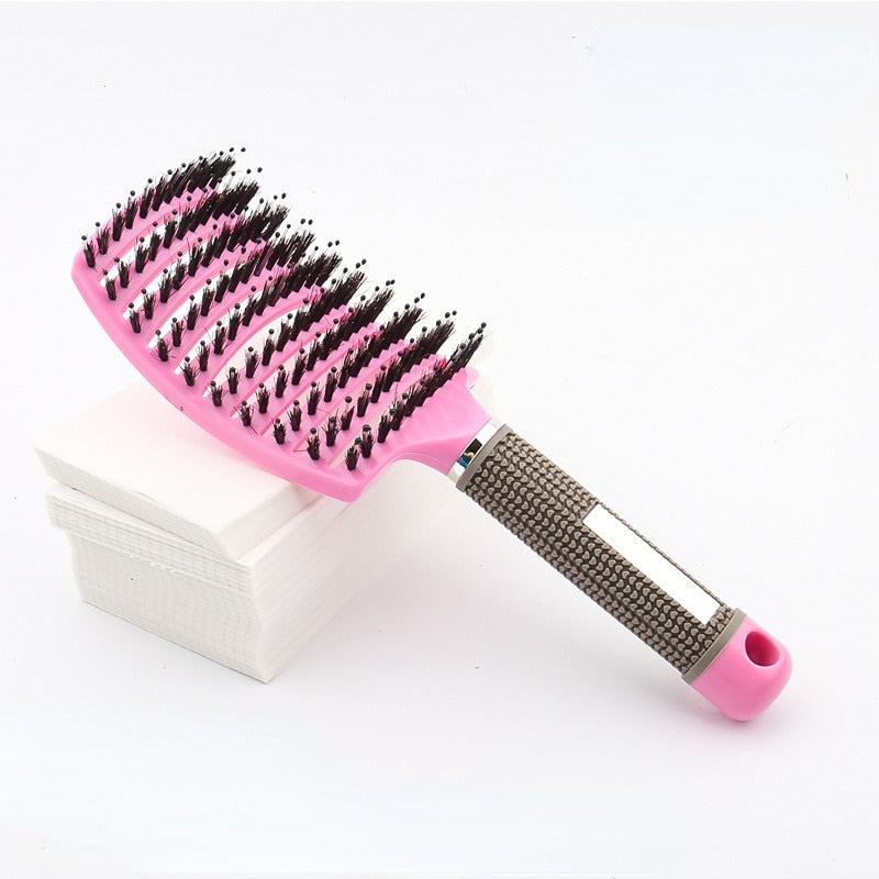 Scalp massage feature close-up on unisex detangling hairbrush