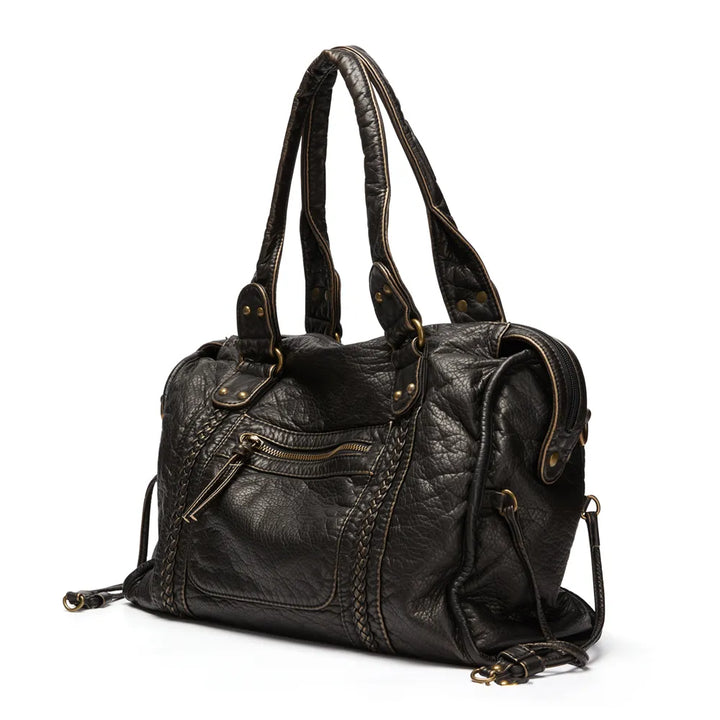 Modern women's black handbag with secure zip closure