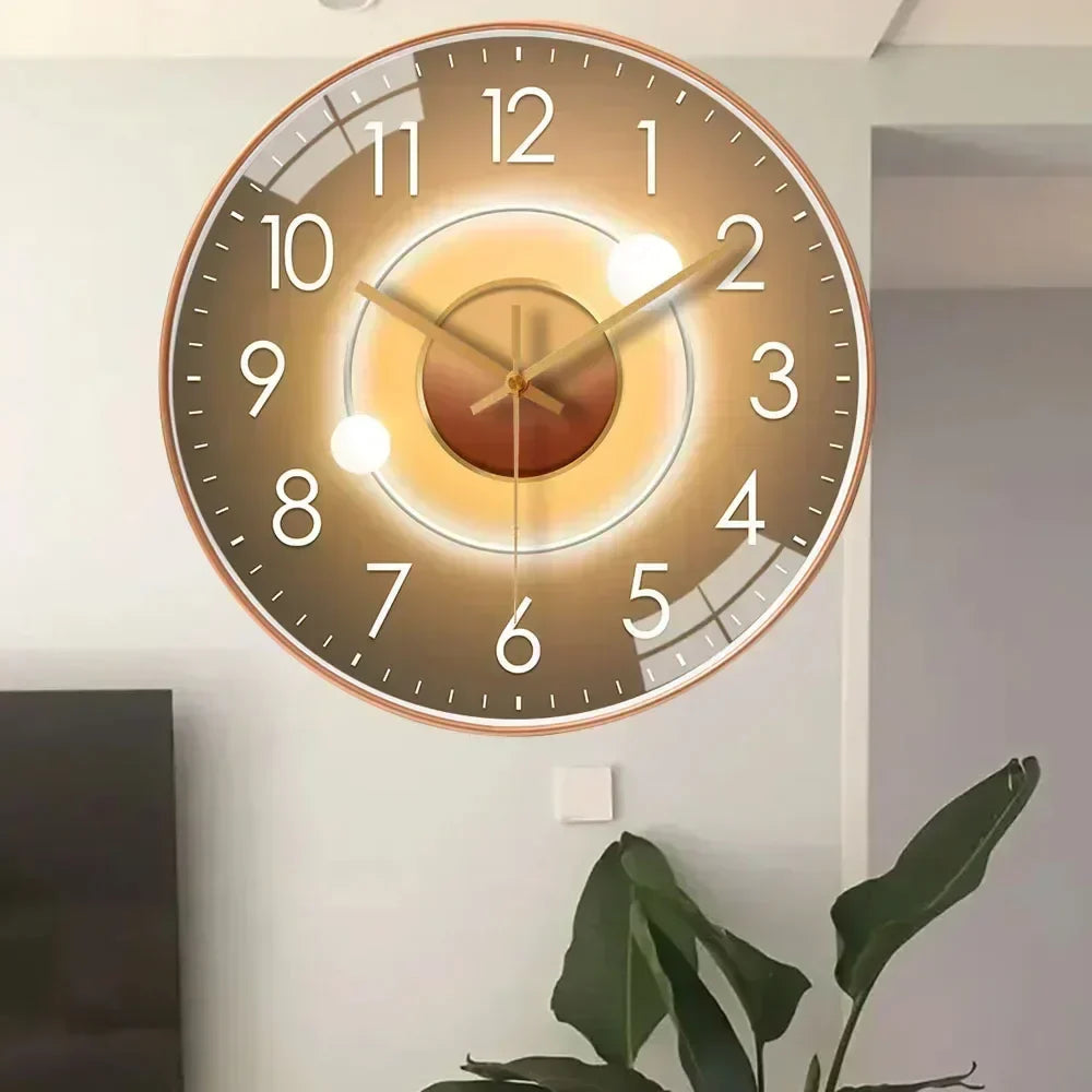 Modern golden tone silent wall clock hanging on a light wall
