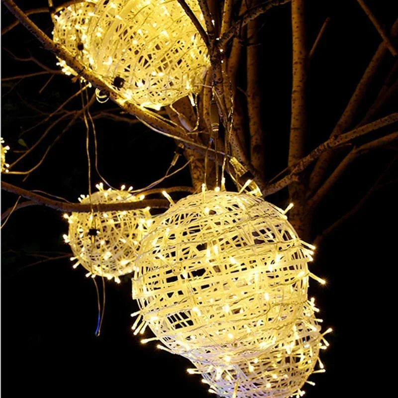Rattan sphere string lights glowing softly for garden party decor and patio lighting