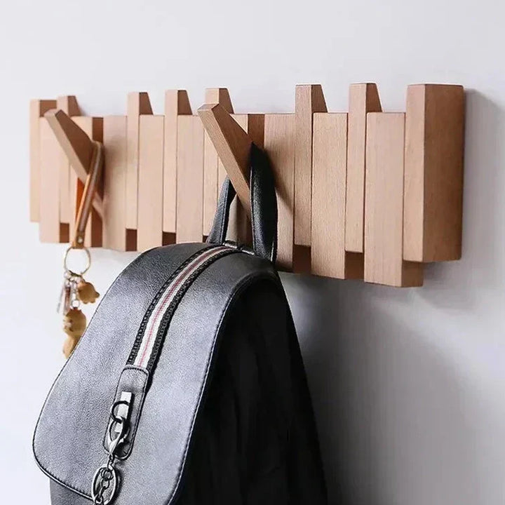 Angled view of the wooden wall mount organizer in natural finish