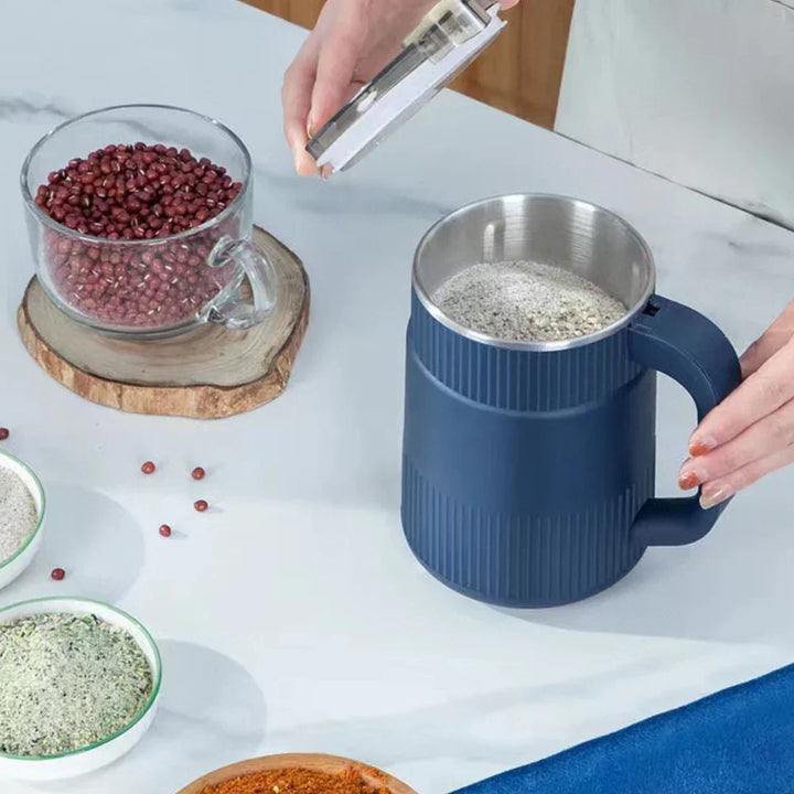 Stainless steel blades in a portable herb grinder and kitchen tool