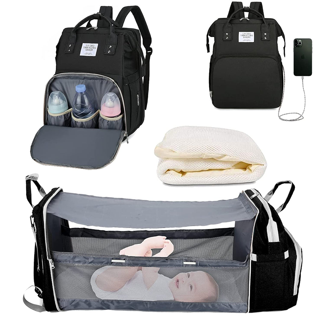 Black baby changing bag backpack with fold-out travel crib and changing mat